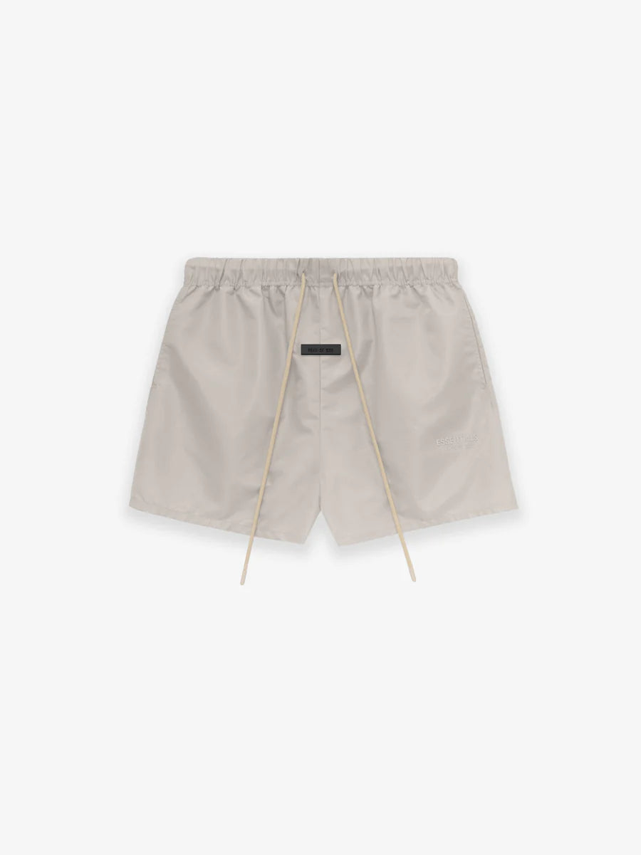 Fear of God Essentials Running Short in Silver Cloud xld