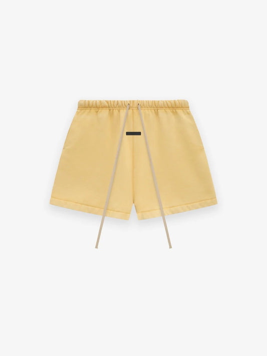 Fear of God Essentials Heavy Fleece Soccer Shorts in Amber xld