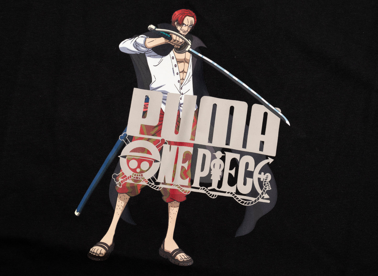 Puma x One Piece Graphic Tee in Black